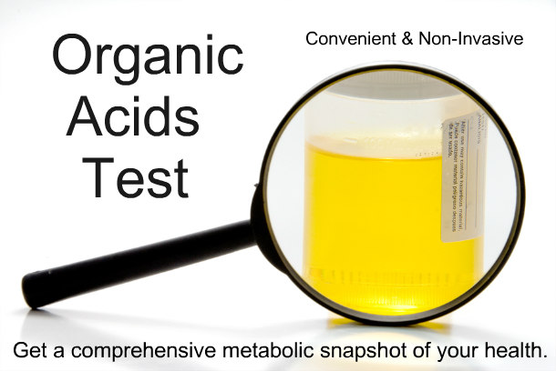 Urine sample under magnifying glass for organic acids test.